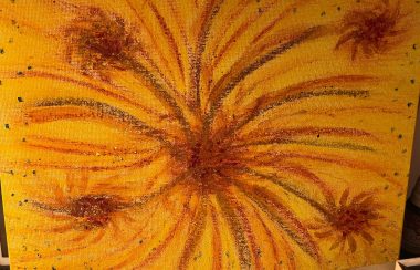 A sunflower painting with bright orange and red colours on an orange background.