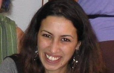 Katia Atif arborant un sourire