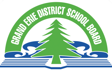 Green semi circle sits above a green evergreen tree with blue waves surrounding the bottom half of the tree. Grand Erie District School Board in text all along the green semi circle. with the withs Learn Lead and Inspire all sitting beneath the tree in green, orange, and blue boxes.