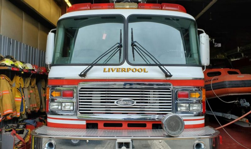 The front of a red Liverpool fire engine.