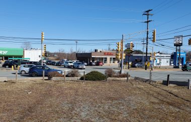 An intersection with a view of Tim Hortons and Sobeys outlets