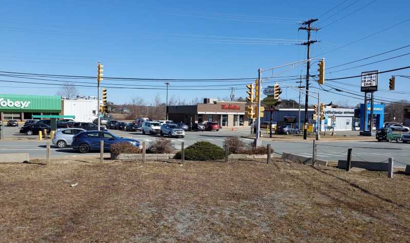 An intersection with a view of Tim Hortons and Sobeys outlets