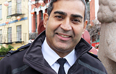 A picture of chief constable Del Manak in uniform outside.