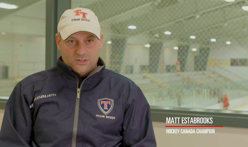 A still of Matt Estabrooks in a hockey rink.