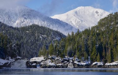 A landscape photo of s mountain scene and river