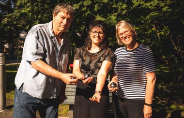 Pictured is René Daigle, husband of the late councillor Rosanne Cohen, Johanne Gauvin, director of the constituency office of the MNA for Brome-Missisquoi, Isabelle Charest, and Lynda Graham, substitute mayor and councillor for district 5, celebrating the inauguration of the newly renovated Place Rosanne-Cohen. The are each holding a specially made pétanque ball.