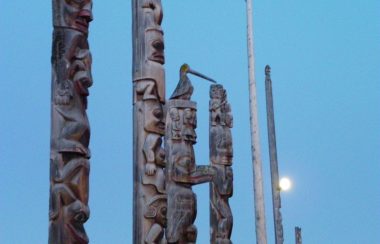 Historic totem pols in Gitanyow. Source: Gitanyow Hereditary Chiefs.