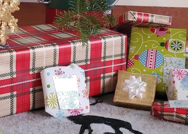 Wrapped presents under a Christmas tree