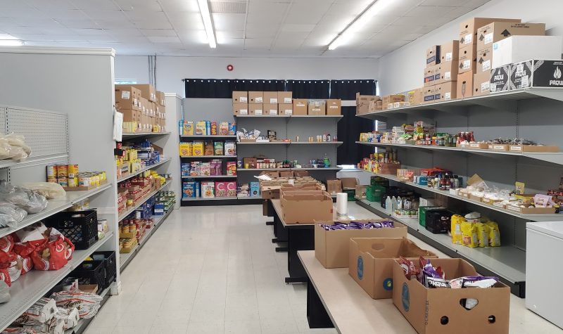 Shelves lined with donated food