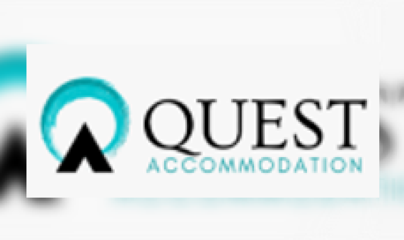 The blue and white Quest Accommodation logo.