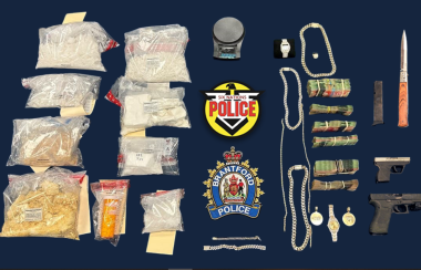 Packages of Illicit drugs, weapons, jewelry and police insignia from Brantford Police and Six Nations Police Services.