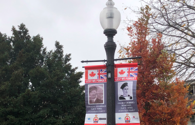 A Remembrance Day banner of Gerald J. Fitzgerald and George (Robbie) Robinson is shown in the Templin Gardens in Fergus, Ontario.