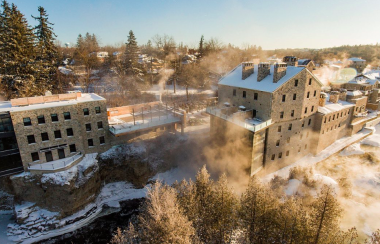 An aeriel shot of the Elora Mill Hotel and Spa on a sunny winter day.
