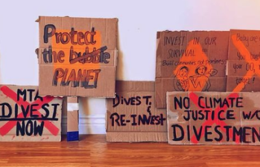 Signs prepared by Divest MTA for Friday’s Global Climate Strike event. Image: Instagram post by Divest MTA