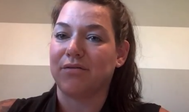 Youtube screencap of woman speaking at online meeting