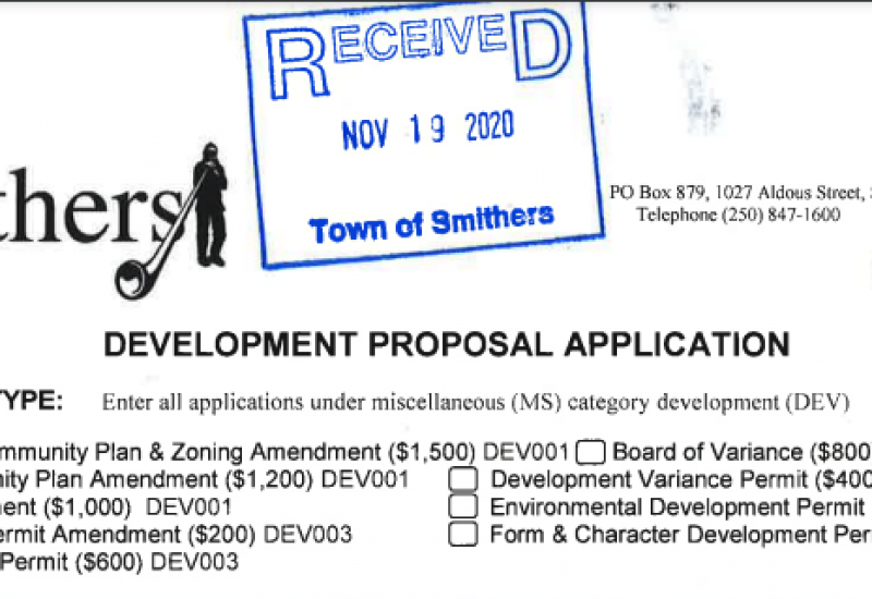 A black and white screenshot of a development proposal application to the Town of Smithers with two royal blue stamps on top.