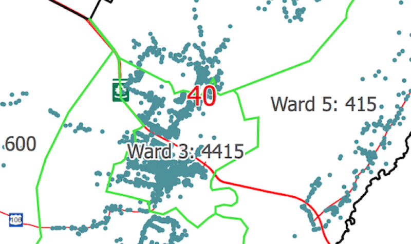 A map showing dots representing residences and lines delineating electoral wards.