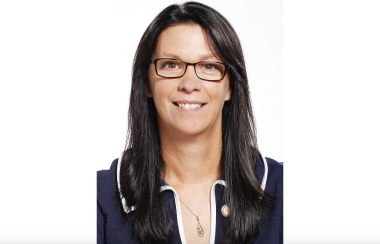 Portrait photo of Health and Wellness Minister Michelle Thompson against a white background.