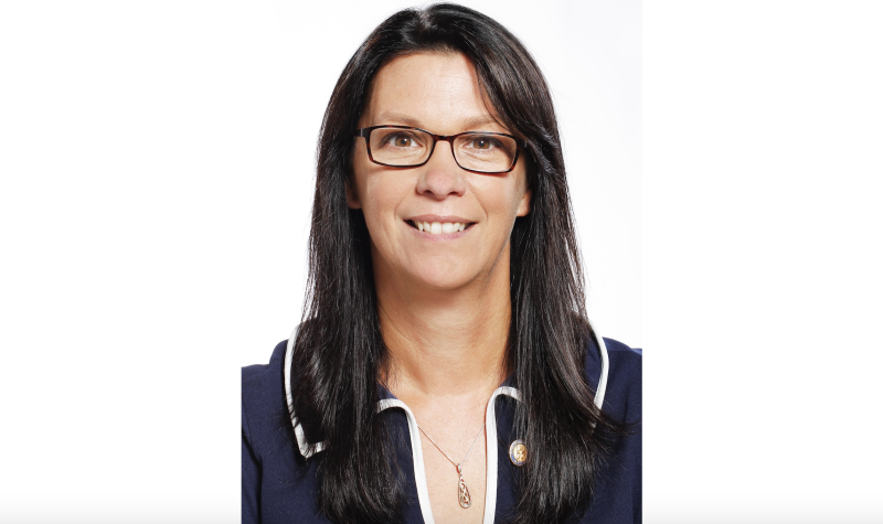 Portrait photo of Health and Wellness Minister Michelle Thompson against a white background.