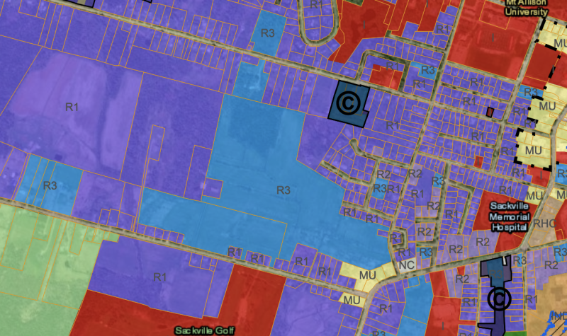 A detail of a zoning map with properties in different colours.