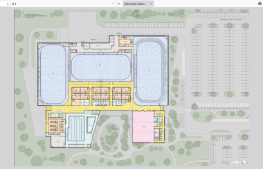 A coloured diagram shows three full size ice sheets and seating areas taking up three quarters of the building design with a swimming pool about one-third the size of an ice sheet and a community hall of similar size, surrounded by parking and some green space.