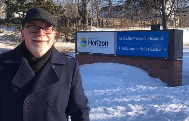 Councillor and mayoralty candidate Shawn Mesheau outside of the Sackville Memorial Hospital. Photo: Contributed.
