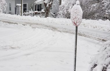 A snow covered stop sign and road after a snowstorm on Feb. 2 in southern Nova Scotia.