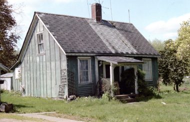 A photo of the 145 year old heritage home Turner House. It is an exterior photo of the building. There is a house, lawn and it is a sunny day.