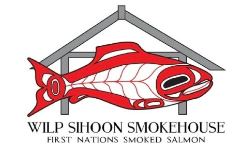 A red and white company logo in Indigenous art work. It shows a salmon.