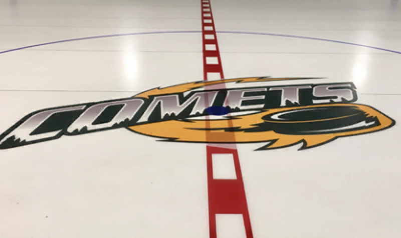 The logo of the Pontiac Senior Comets inlayed at centre ice.