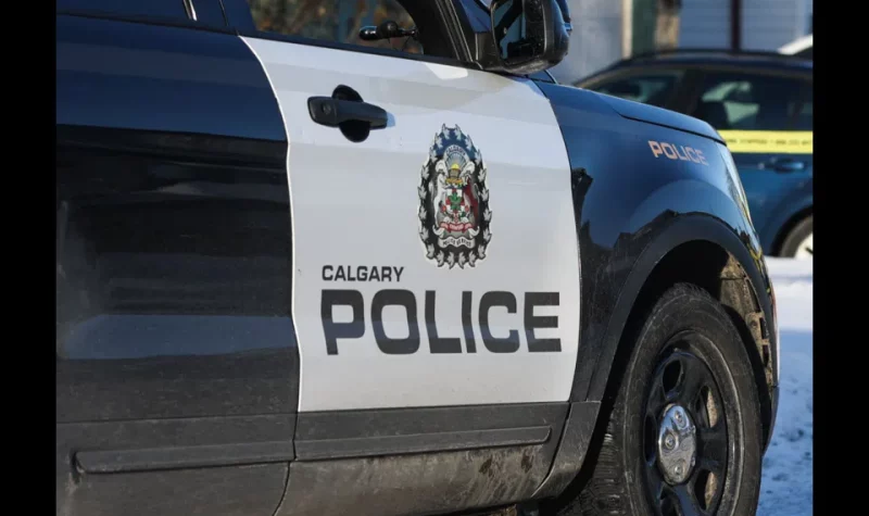 A police cruiser with 'Calgary Police Service' along the two side doors.