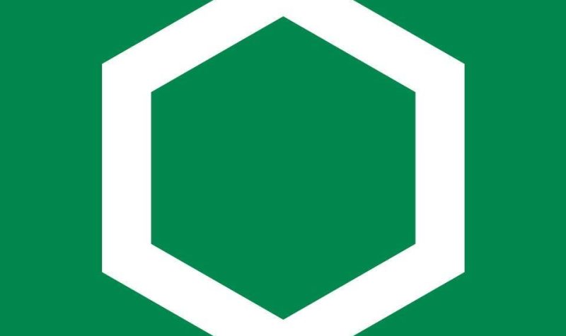 The logo of the Caisse Desjardins, a white hexagon on a green background.