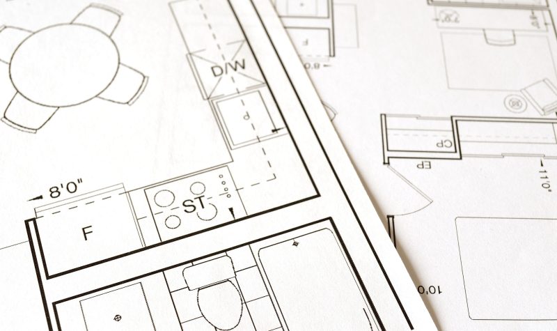 A drawing on a sheet of paper. Blueprint for a building. Black ink on white paper.