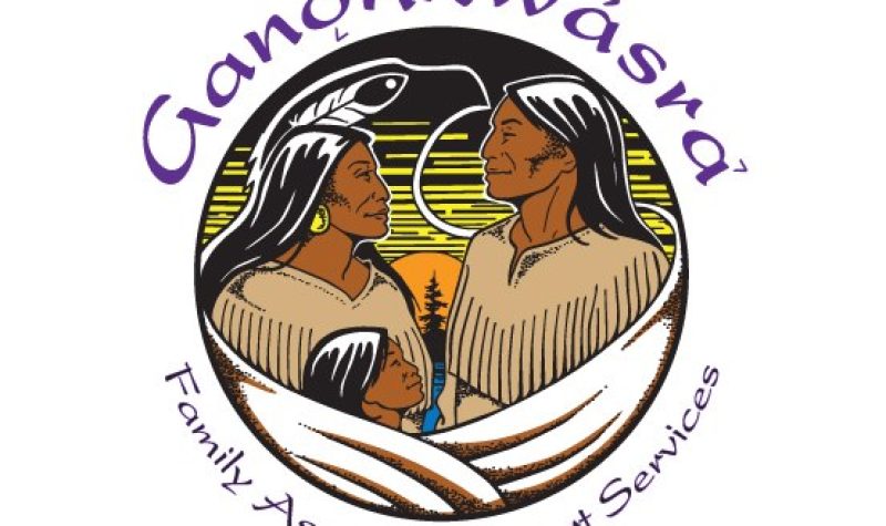 Ganohkwasra Logo, drawing of two women and a child with a bird silhouette in the background
