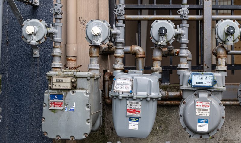 Photo of three natural gas meters.