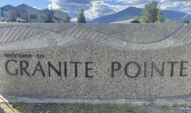 Stone sign that says welcome to granite pointe.