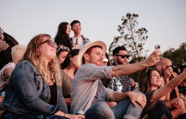 A group of people are having fun and taking photos