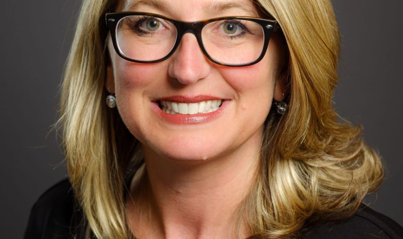 A portrait photo of Minister of agriculture Lana Popham in a black blouse