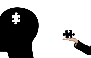 A silhouette of a head with a missing puzzle piece (animated)