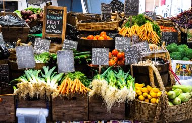 Various foods and vegetables on wooden boxes.