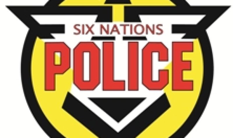 Six Nations Police logo on white background, with yellow, black, red and white colours.