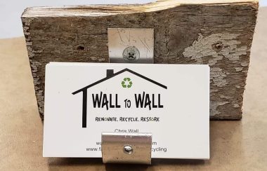 Wall to Wall business cards in an upcycled stand.